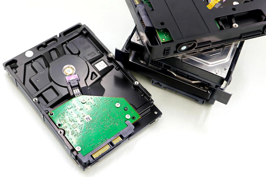 Modern storage drives including SSD and HDD on circuit board